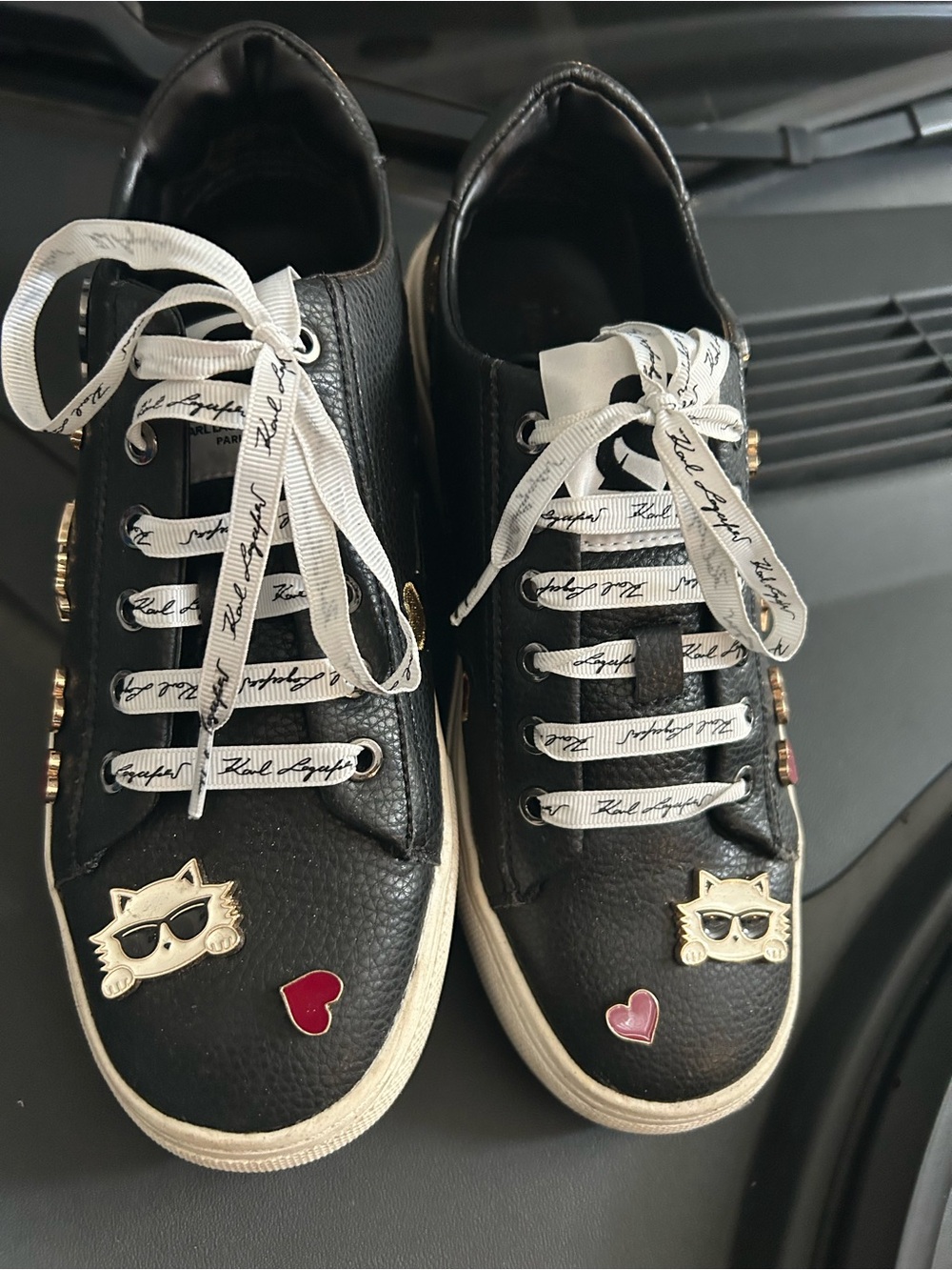 Karl Lagerfeld Black Sneakers with White Laces and Gold Cat Charms